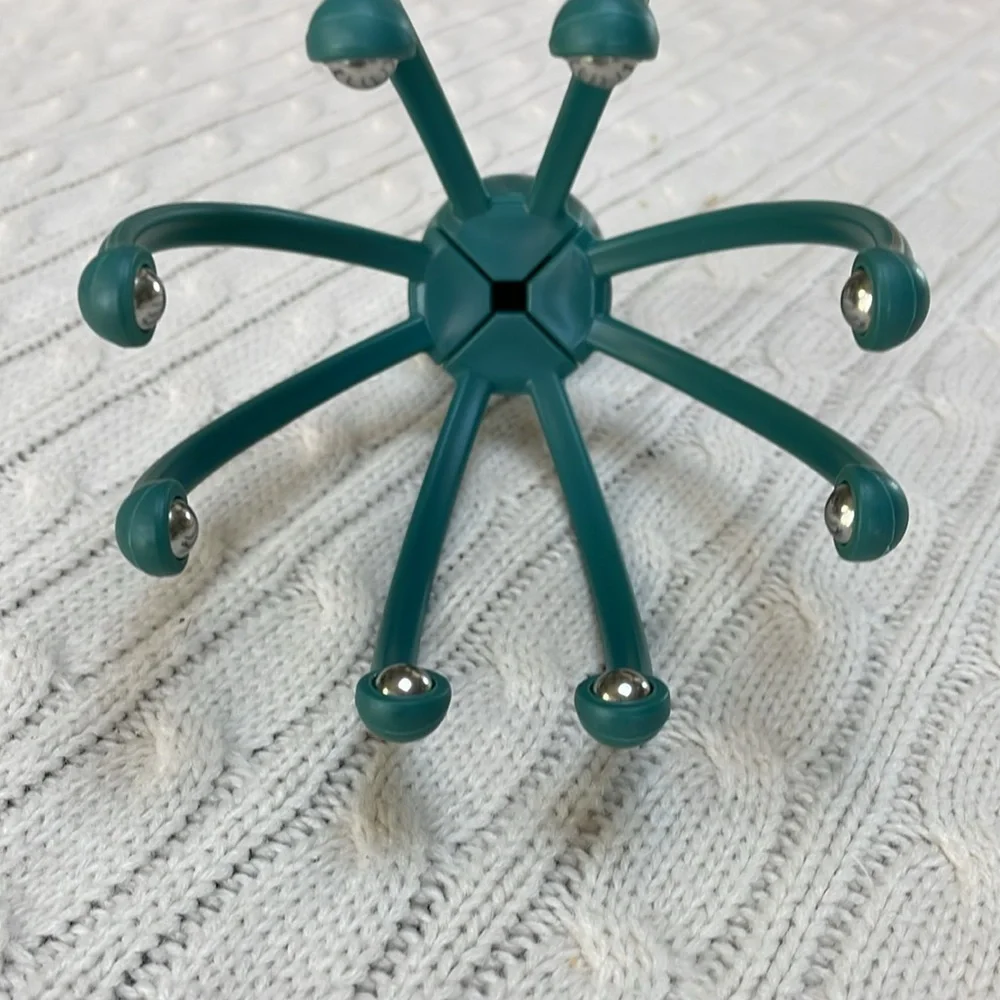 Scalp massager gently massages pressure points and sensitive nerves on head/neck